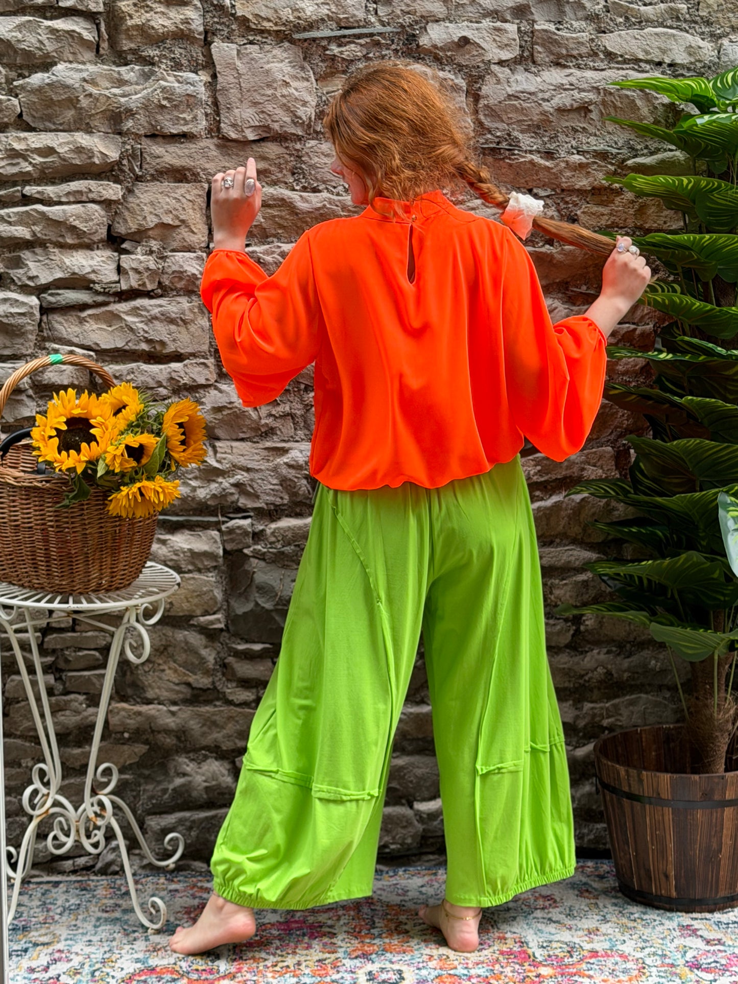Bright orange bubble hem blouse in one size fits 8-16
