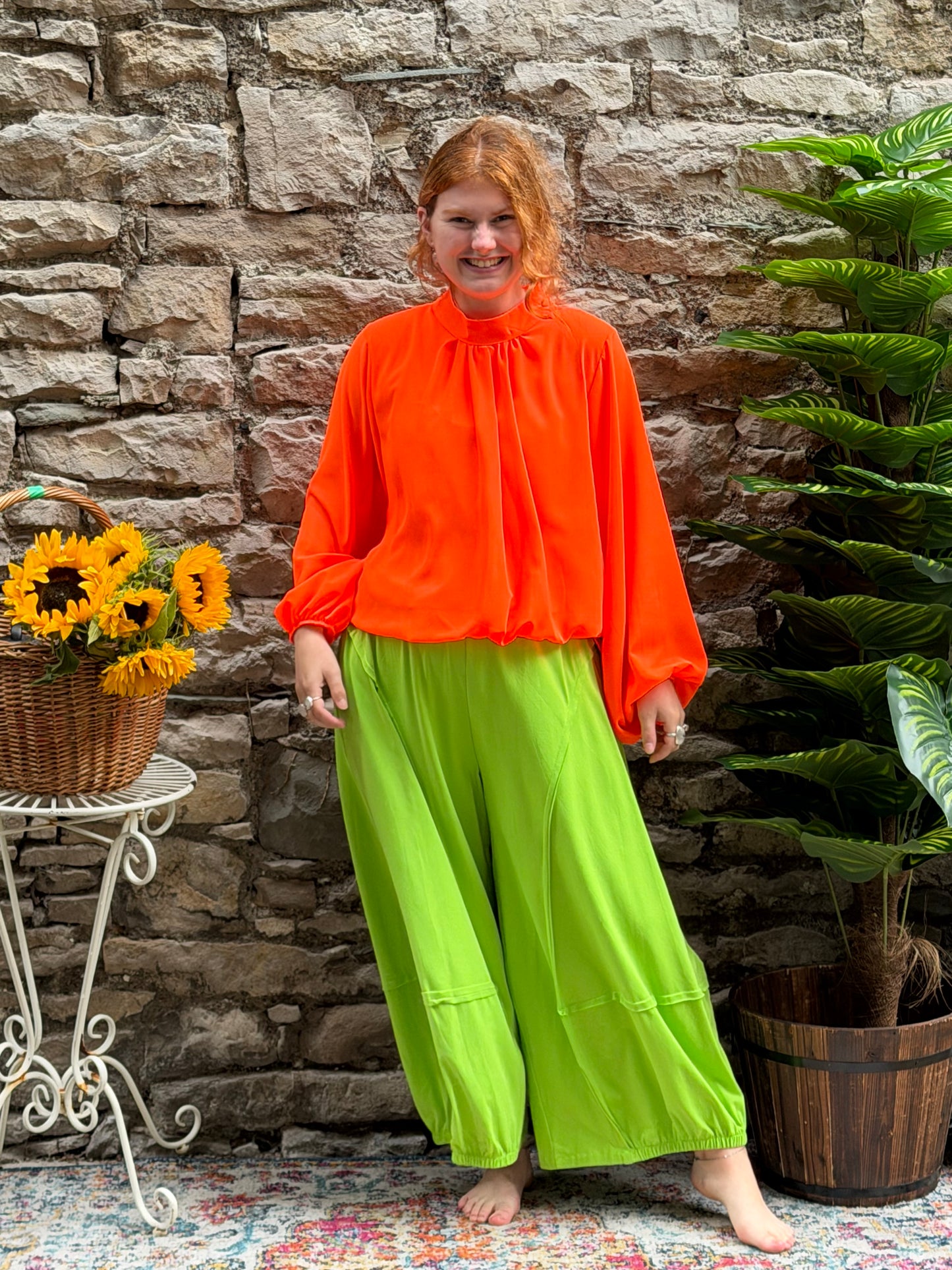 Bright orange bubble hem blouse in one size fits 8-16