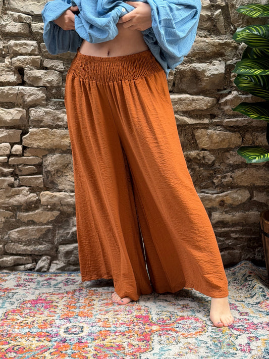 Amoki ruched waist Crinkle Fully Elasticated Floaty Trousers One Fit Size 8-22 in rust