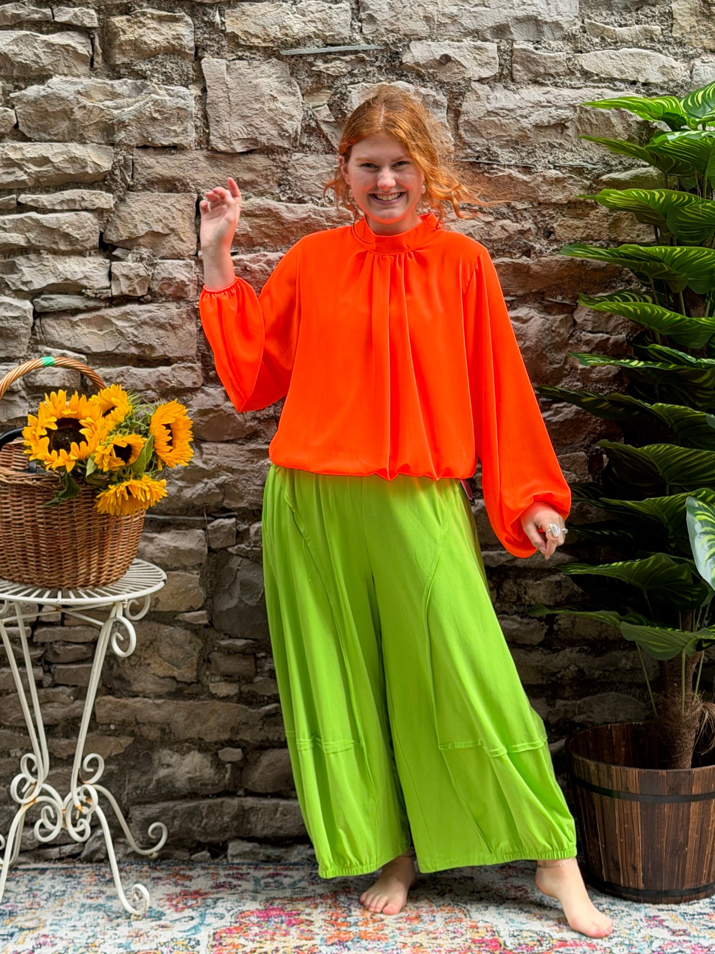 Bright orange bubble hem blouse in one size fits 8-16